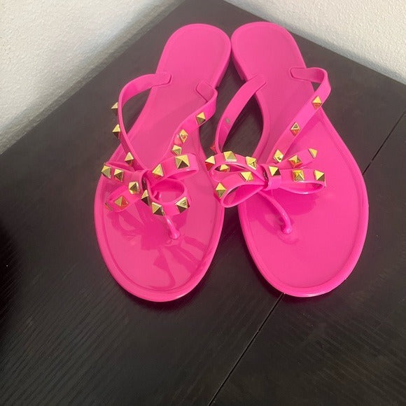 Stylish Pink Sandals with Gold Accents