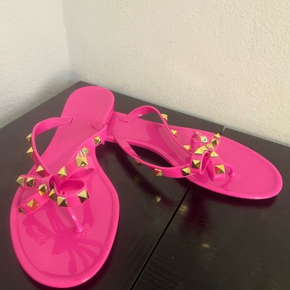 Stylish Pink Sandals with Gold Accents
